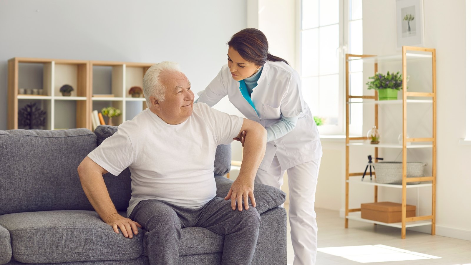 Caregiver assisting a client with in-home health services