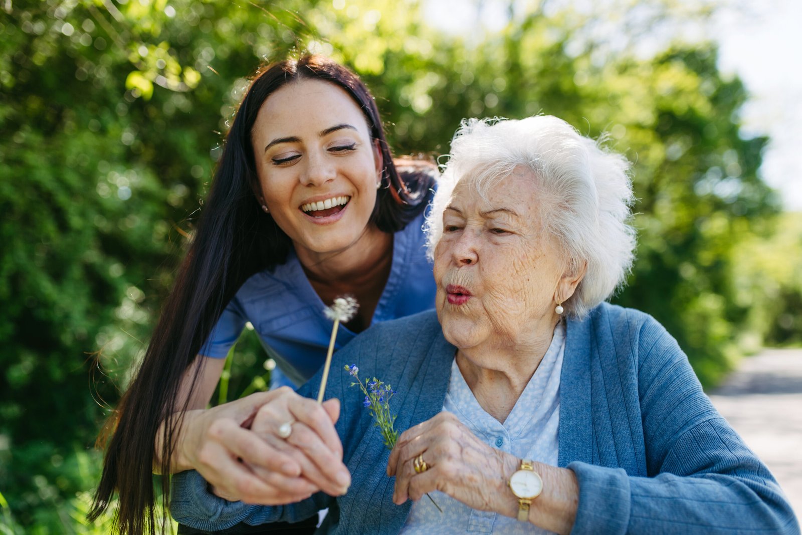 Compassionate healthcare professional caring for a senior client at home